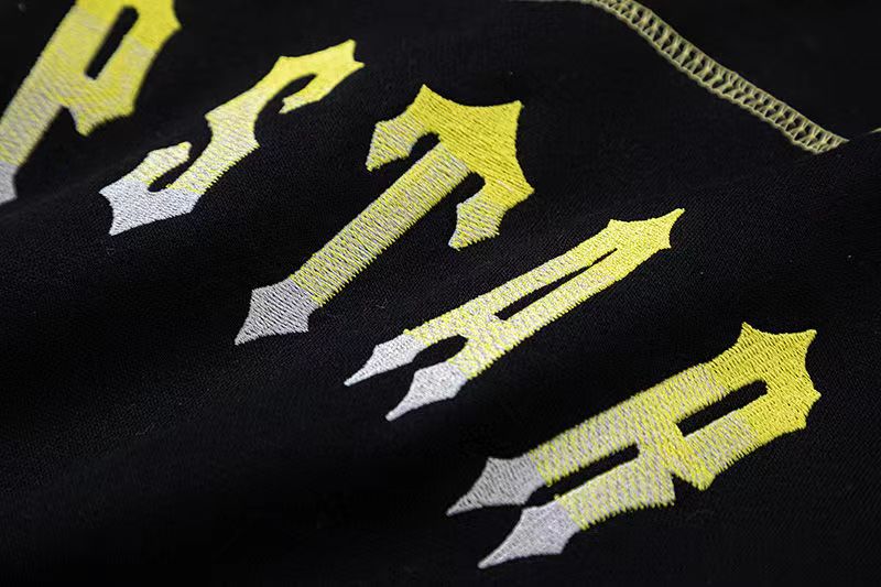 CONJUNTO TRAPSTAR NEGRO / AMARILO